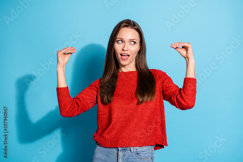 Bla bla bla. Silly lady hands expressing talking fingers wear red knitted sweater isolated blue color background