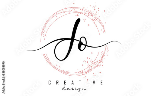 Handwritten JO J O letter logo with sparkling circles with pink glitter.