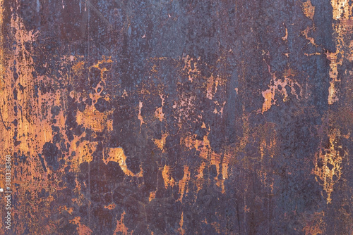 old rusty metal texture close-up with elements of peeled paint