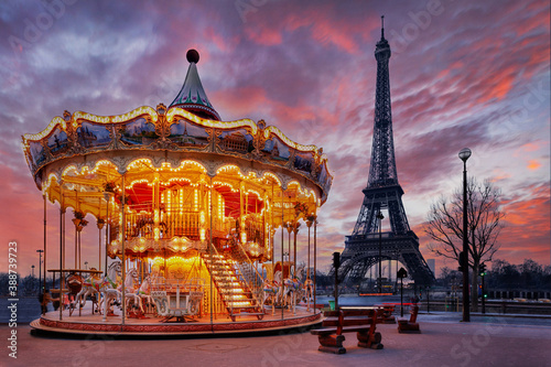 sunset over vintage carousel close to Eiffel Tower, Paris