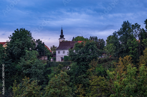 RASTOKE, CROATIA - AUG 21, 2020: Church in new part of Rastoke village, the historic center of the Croatian municipality of Slunj. This old part of Slunj is known for its well-preserved mills.