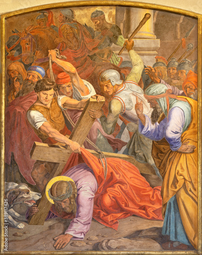 VIENNA, AUSTIRA - OCTOBER 22, 2020: The fresco Fall of Jesus undwer the cross as part of Cross way station in the church of St. John the Nepomuk by Josef Furlich (1844 - 1846).