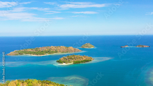 Aerial view of Seascape with beautiful beach and tropical islands. Sallangan Islands, Simoadang Island. Mindanao, Philippines.