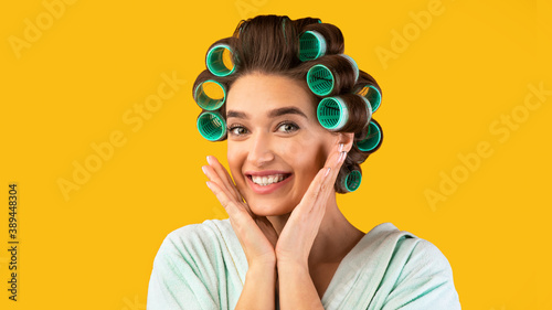 Pretty Lady With Hair Curlers Posing Over Yellow Background, Panorama
