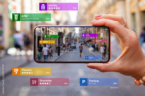 Concept of augmented reality technology being used in mobile phone for navigation and location based services