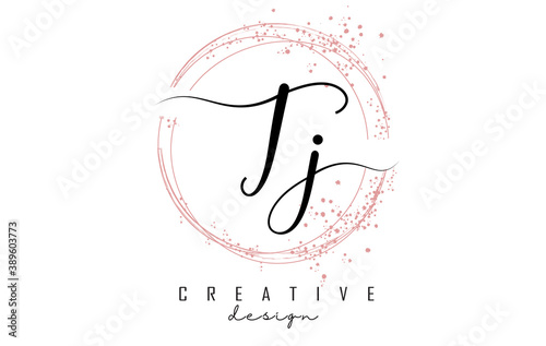 Handwritten TJ T J letter logo with sparkling circles with pink glitter.
