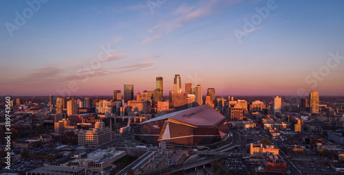 Drone flight over the skyline of Minneapolis, Minnesota USA with a nice view to the US Banks Stadium from the Vikings 