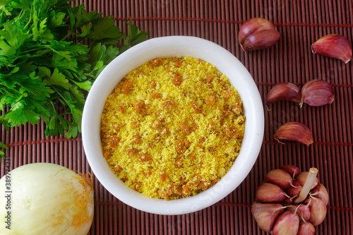 Brazilian farofa. Traditional dish of Brazil cuisine made with manioc flour, widely used in festivities and at Christmas