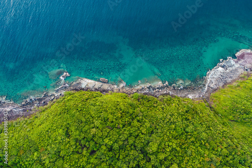 Aerial view seascape tropical green tree forest on sea island