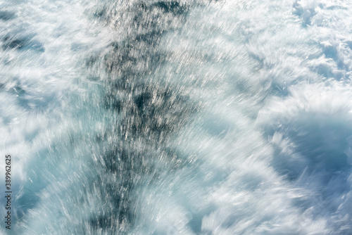 Sea water splash texture - blue transparent fresh ocean water background