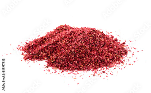 Ground Sumac Powder Spice. Isolated on White Background.