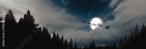 Panoramic - Santa Claus flying over pine trees in his sleigh under the moonlight