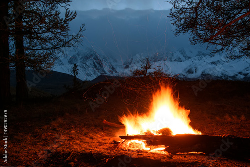 bonfire mountains flame fire cloudy