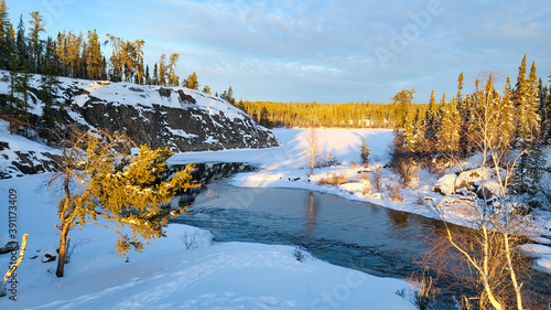 River flowing near Cameron river falls in the winter time