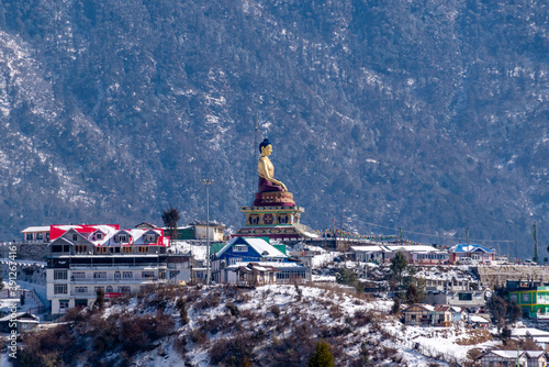Giant buddha statue on top of a high mountain overlooking the town of Tawang, western Arunachal Pradesh, north east India.