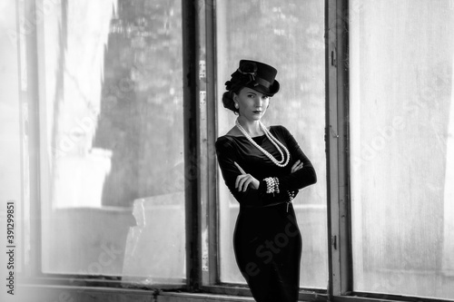 Beautiful woman as Coco Chanel