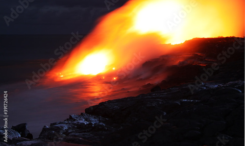 Lava entry in to the ocean at night (Puhi-o-Kalaikini at Big Island, Hawaii)