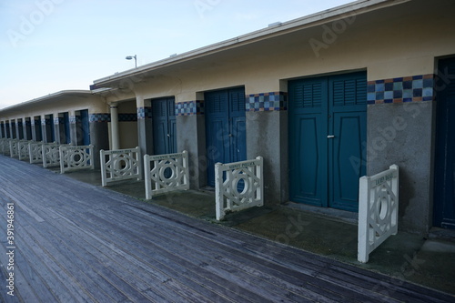 famous boardwalk with their beach cabins of the movie stars in Deauville, France 