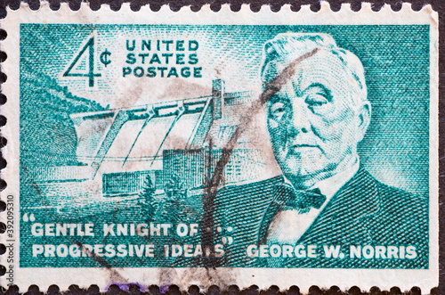 USA - Circa 1961 : a postage stamp printed in the US showing a portrait of Senator George W. Norris with the Norris Dam, located north of Knoxville, Tennessee