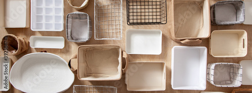 Flat lay of Marie Kondo's storage boxes, containers and baskets with different sizes and shapes