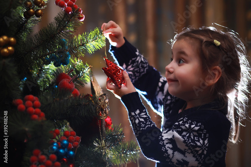 Merry and bright christmas. Lovely baby enjoy christmas. Santa girl little child celebrate christmas at home.