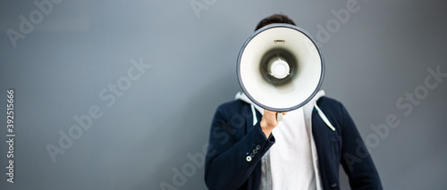 Man Hand Holding Megaphone