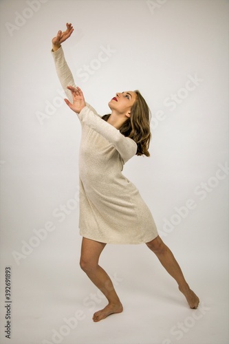 choreographed dancing beautiful girl white background contemp