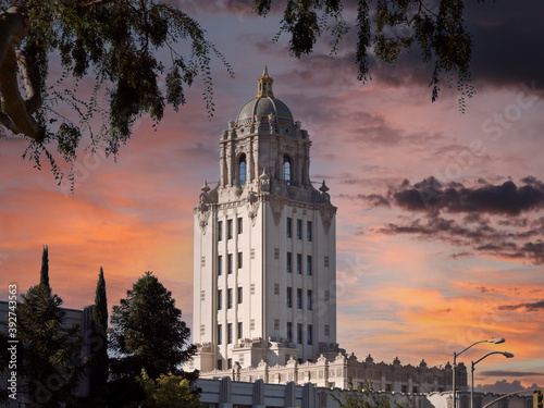 Beverly Hills City Hall building with sunset sky.