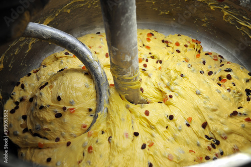 preparation of the typical Italian Christmas Panettone and Colomba cake the dough with the candied fruit is ready