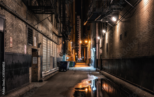 Dark abandoned alley at night downtown Chicago