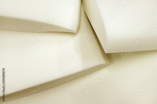 Foam rubber.Molded pieces of foam. Production of upholstered furniture, details. Close-up photos, selective focus.