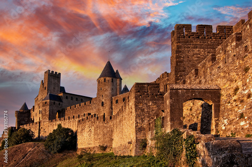 Cité de Carcassonne, view of the walls of the French medieval fortress of Carcassonne at sunset, France