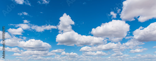 Blue Sky with Puffy White Clouds Background-2