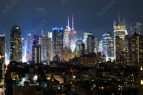 New York, NY, USA - June 29, 2019: Night Manhattan view from The Press Lounge