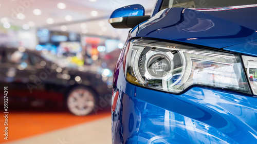 new cars in dealer showroom interior background