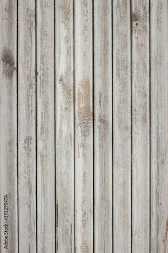 Shabby light white wooden vertical texture macro