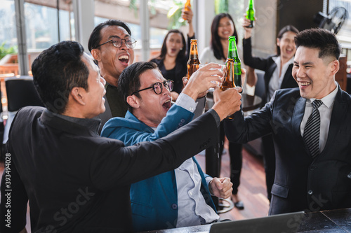 A celebration of business success and performance Business groups relax with wine, beer and bar parties.