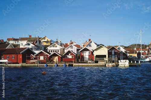 Experience the serene beauty of Sweden's archipelago coast with its iconic red wooden houses, chilly sea and tranquil atmosphere. Perfect for tourism and travel