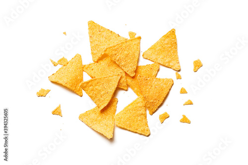 Golden nachos chips isolated on white background. top view