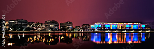 Panoramic photo of Washington, D.C. skyline at night.