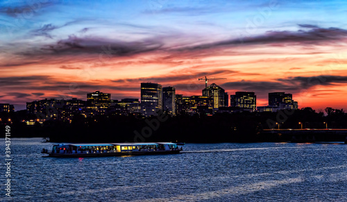 Rossyln, Arlington, Virginia, USA downtown city skyline at dusk on the Potomac River.