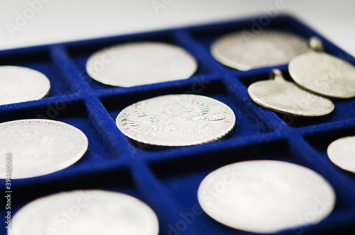 Numismatic research coins set on tray