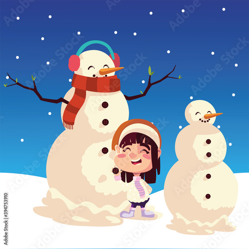 merry christmas little girl snowman with earmuffs in the snow celebrating