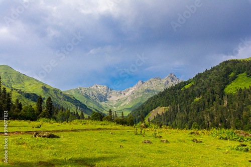 Scenery mountain landscape at Caucasus mountains with clouds.