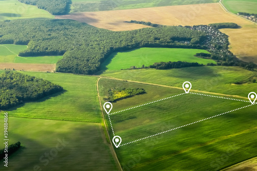 Land plot Consist of aerial view of greenfield, position point and boundary line to show location and area. A tract of land for owned, sale, development, rent, buy or investment.