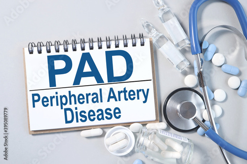 PAD - Peripheral Artery Disease, text on notepad on gray background