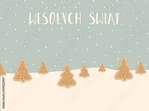 Las piernikowych choinek w śniegu z tekstem Wesołych Świąt