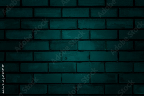 dark emerald green brick wall with noise grain effect, empty space for text background
