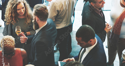 Diverse business people at a dinner party