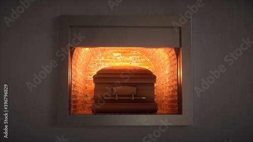 Coffin being cremated in a crematorium.